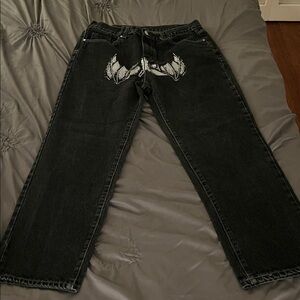 Black Men's Jeans with White Graphic Detail